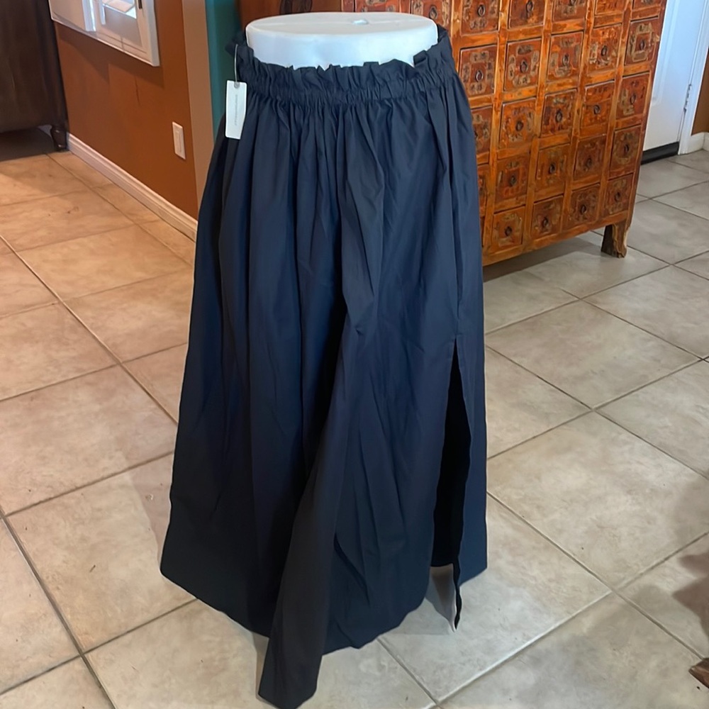 Anthropologie Black Noir Full Cotton Skirt with a peekaboo Slit.